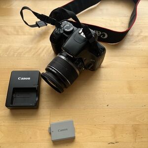 Canon Rebel xsi. Still works. Comes with the charging block and one battery.